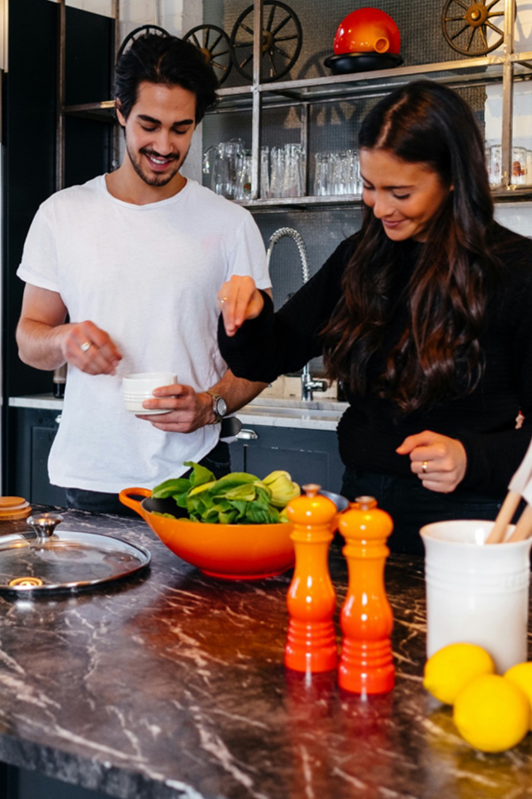 Couple cooking an affordable meal